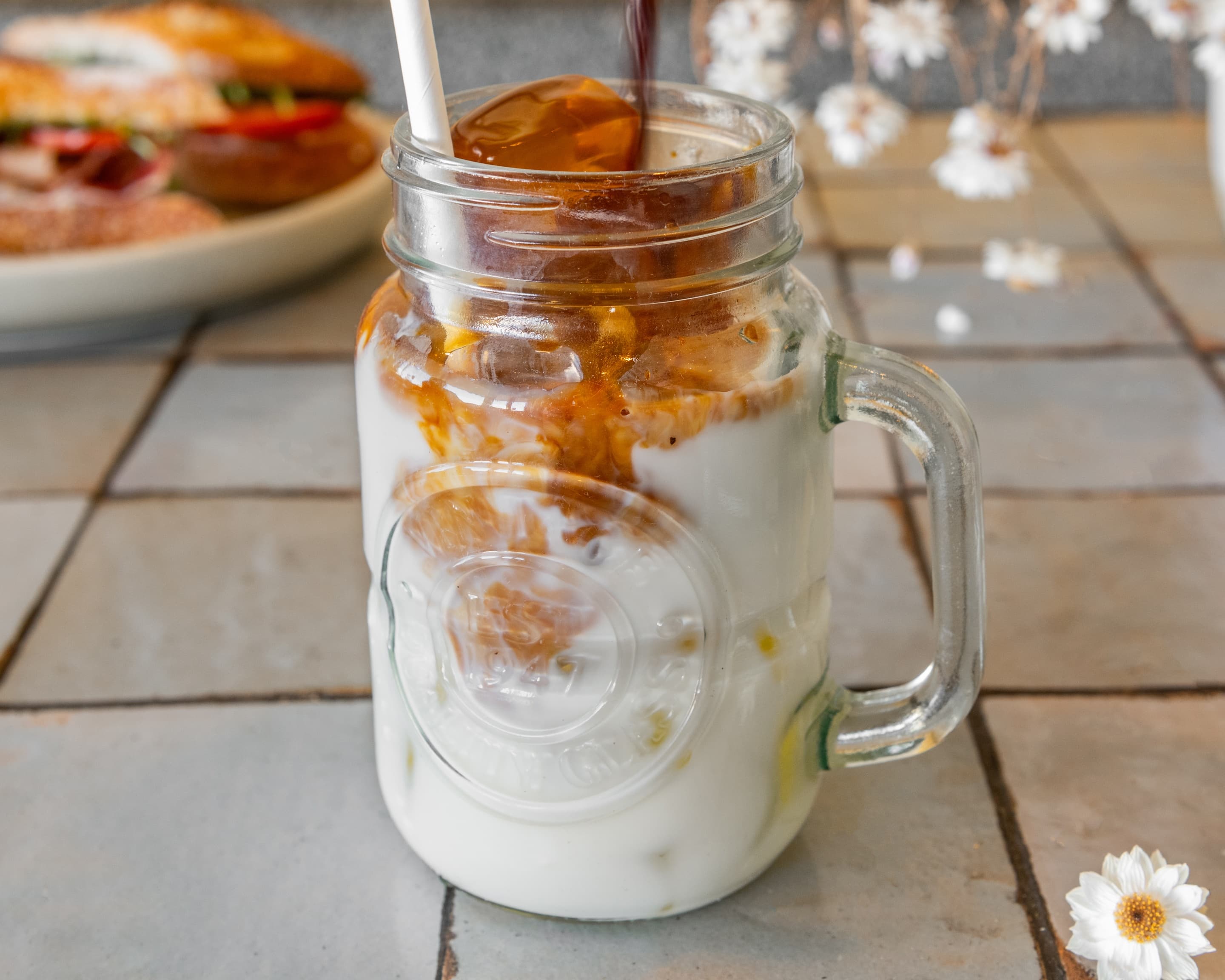 An iced latte served in a glass